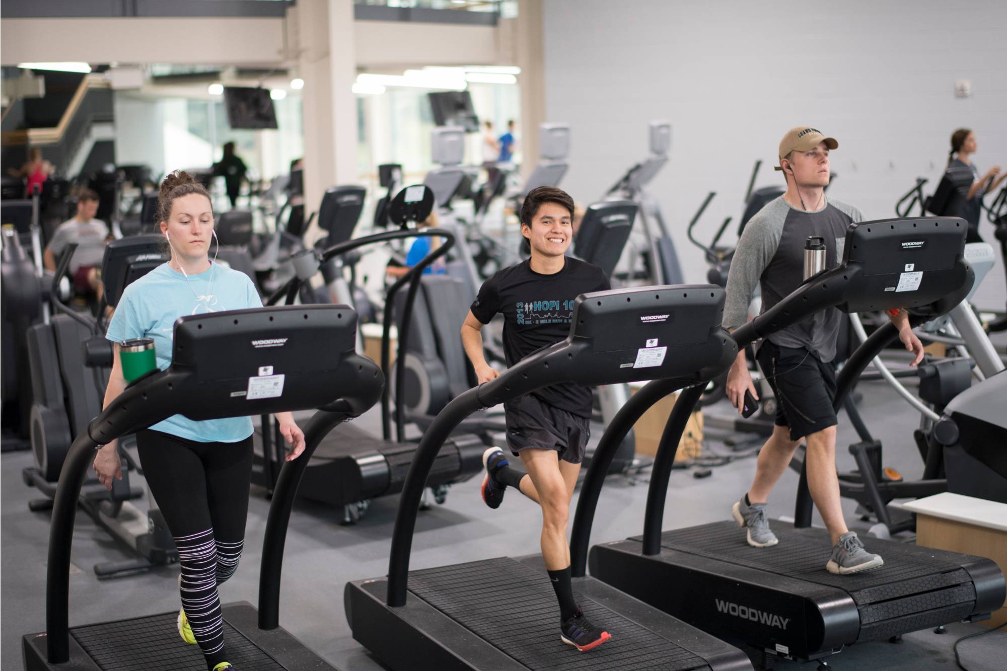 Students running on treadmills
